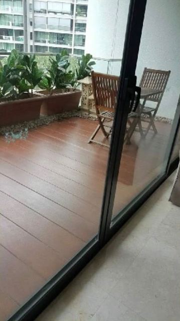 Balcony glass door and decking after cleaning
